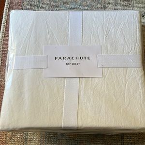 Parachute top sheet